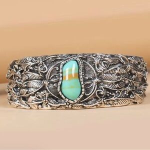 Intricate Silver Bracelet with Turquoise Accent